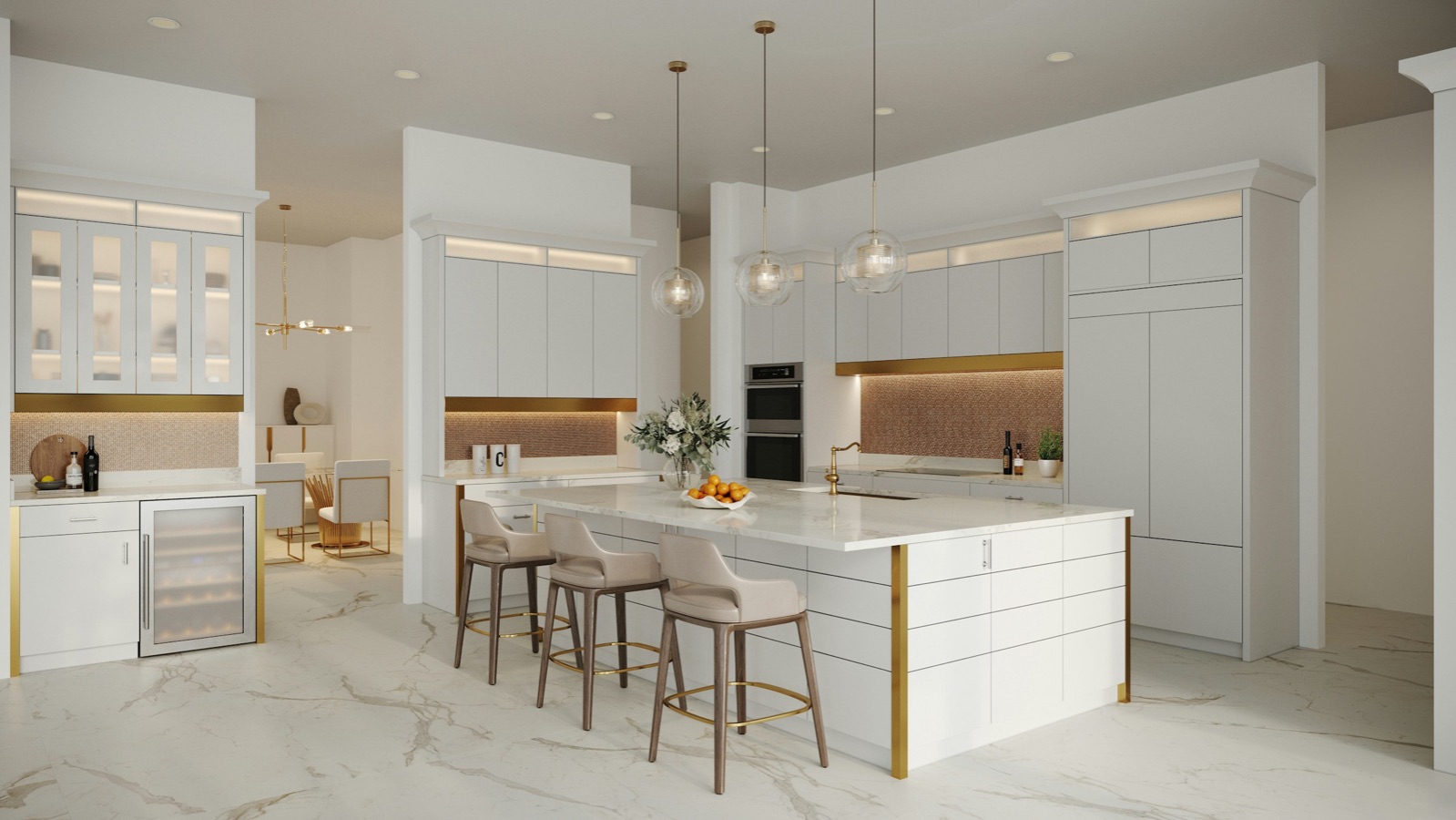 White kitchen with a marble island and brass trim